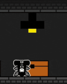 a cartoon character with a skull on his head is standing next to a box in a dark room