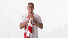 Showing My Scarf Yussuf Poulsen GIF - Showing My Scarf Yussuf Poulsen Rb Leipzig GIFs