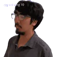 a pixelated image of a man wearing glasses with the number 10 visible