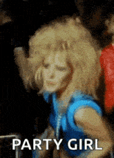 a woman with blonde hair is dancing in a club and the words party girl are on the bottom of the image .