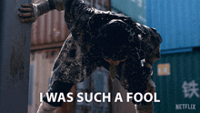 a netflix ad shows a man leaning against a wall and the words " i was such a fool "