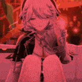 a girl with a braided hair and a necklace is sitting down with her legs crossed