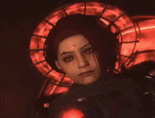 a close up of a person 's face with a red halo around her head .