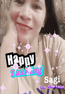 a woman wearing a shirt that says happy tasting is smiling