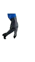 a person in a blue shirt and black pants is standing with their hands on their hips