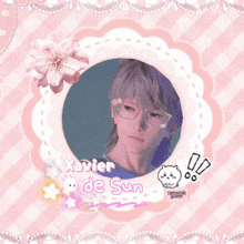 a picture of xavier de sun is in a pink and white frame