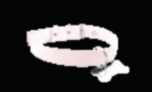 a pink dog collar with a white bone shaped tag attached to it