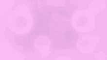 a man wearing glasses is sitting in a chair with pink bubbles coming out of his face .