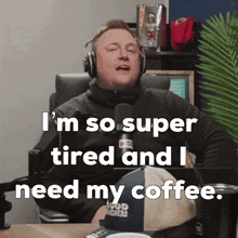 a man wearing headphones says i 'm so super tired and i need my coffee ..