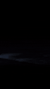 a glowing object in the dark that looks like a heart