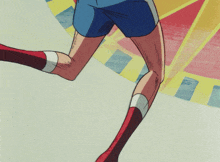 a close up of a person 's legs with red socks