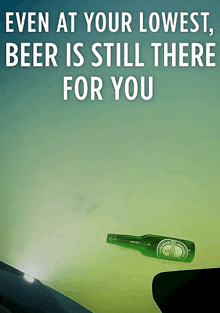a bottle of heineken is floating in the air with the words even at your lowest beer is still there for you