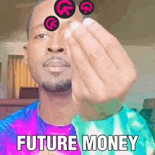 a man in a tie dye shirt holds a coin in his hand and says " future money " on the bottom