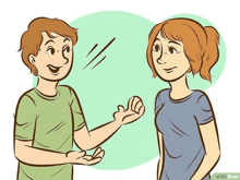 a man and a woman are standing next to each other and talking to each other .