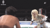 a woman in a wrestling ring with the word stardom on the bottom