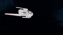 a white space ship with a red stripe on the side of it