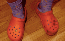 Getting Into A Popular Fashion Fad Even If You Know It’s Ugly. GIF - Crocs Ugly Fashion GIFs