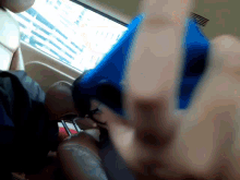 a blurry picture of a person taking a selfie