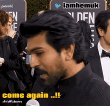 a man in a tuxedo says come again