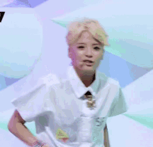 a person wearing a white shirt with the word see on the front