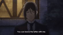 a man in a tuxedo and tie says you can leave the letter with me