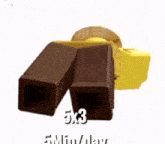 a cartoon character is laying on top of a chocolate bar with the words `` 5x3 '' written on it .