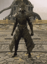 a statue of a knight in armor stands in front of a building