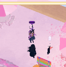 a purple balloon is hanging from the ceiling in a pink room