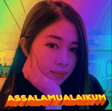 a woman with her hand on her face and the words assalamualaikum on the bottom right