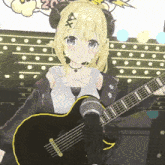 a girl with horns is holding a black guitar