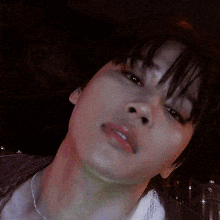 a close up of a person 's face with their mouth open