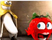 a banana and a strawberry are standing next to each other and smiling .