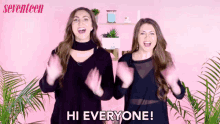 two women standing next to each other with the words hi everyone on the bottom right
