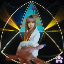 a woman in a white jacket is standing in front of a triangle with the words look at lalisa on the bottom