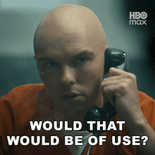 a bald man talking on a phone with the words would that would be of use