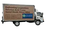 a truck that says " delivering legendary service and crazy good deals since 1994 " on the side