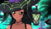 a girl in a witch hat with green eyes