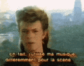 a man is talking in french and says " en fait j 'utilise ma musique differentement pour la scene "