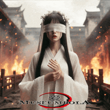 a woman with blindfolds on her eyes stands in front of a burning building with the words museumbola on the bottom right