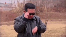 Kim Jong Un Glasses GIF - Kim Jong Un Glasses Sunglasses GIFs