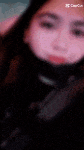 a close up of a woman 's face with the caption capcut at the top