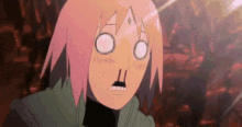 a cartoon character with pink hair is making a funny face .