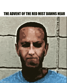 a man in a blue shirt is standing in front of a wall with a caption that says the advent of the red mist