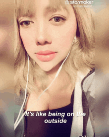 a picture of a woman with headphones and the words it 's like being on the outside