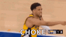 a basketball player is jumping in the air with the word choke written on the screen .
