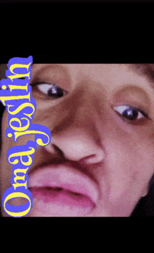 a close up of a person 's face with the words oma justin on the bottom right