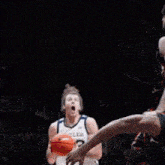 a basketball player with the number 33 on his jersey is jumping in the air