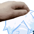 a close up of a person 's hand on a cartoon character .