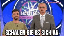 two men are standing next to each other in front of a sign that says million