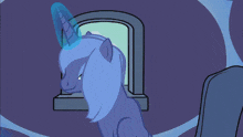 a cartoon drawing of a unicorn with a crown on its head is on a television screen